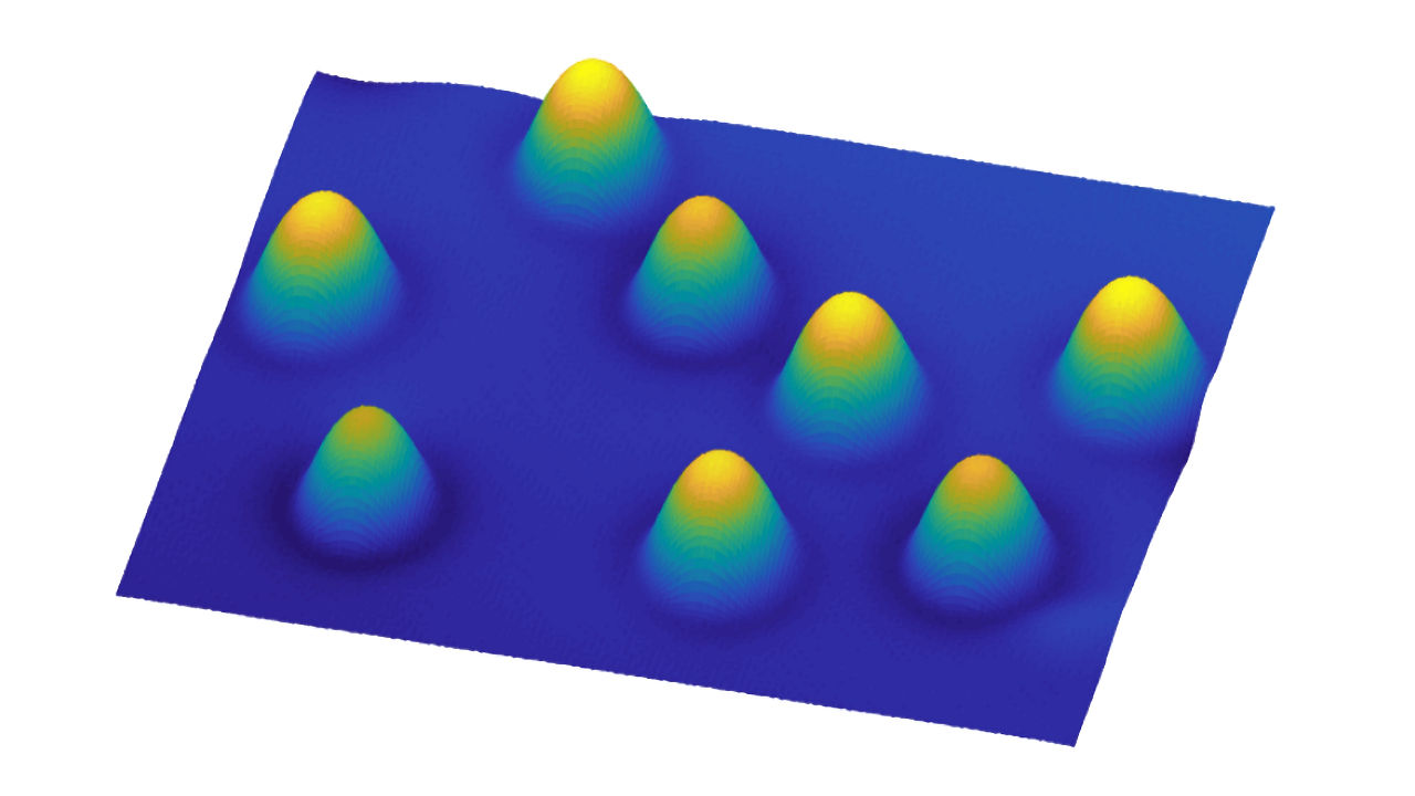 Rastertunnelmikrosopie-Aufnahme einer Oberfläche mit einzelnen Atomen